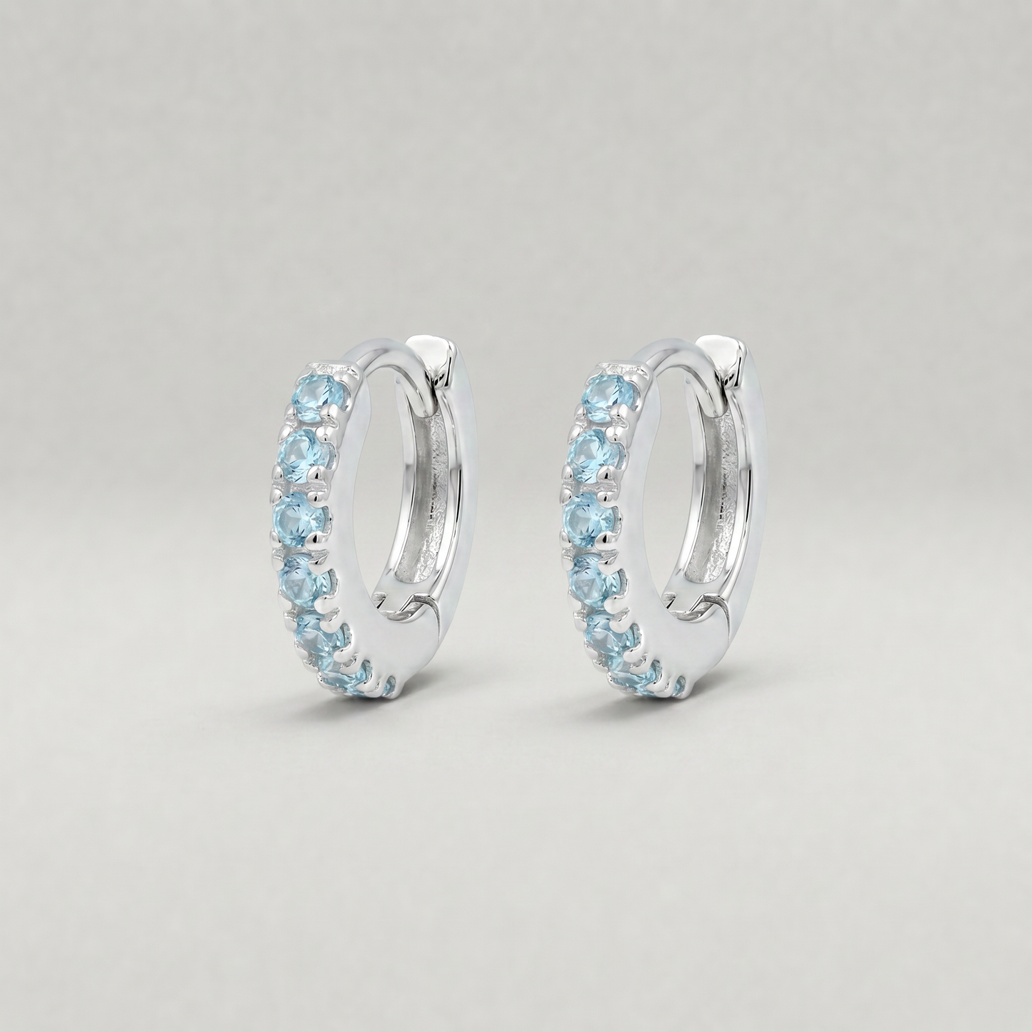 Sterling Silver Aquamarine CZ Huggie Hoops