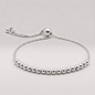 925 sterling silver adjustable 4mm beaded slider bracelet on a plain background.