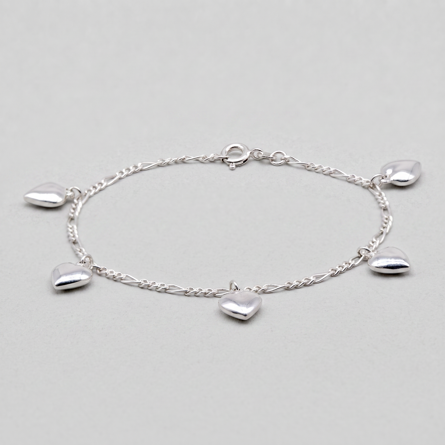 925 Sterling Silver 5 Puffed Heart Charm on Figaro Chain Bracelet 7.5"