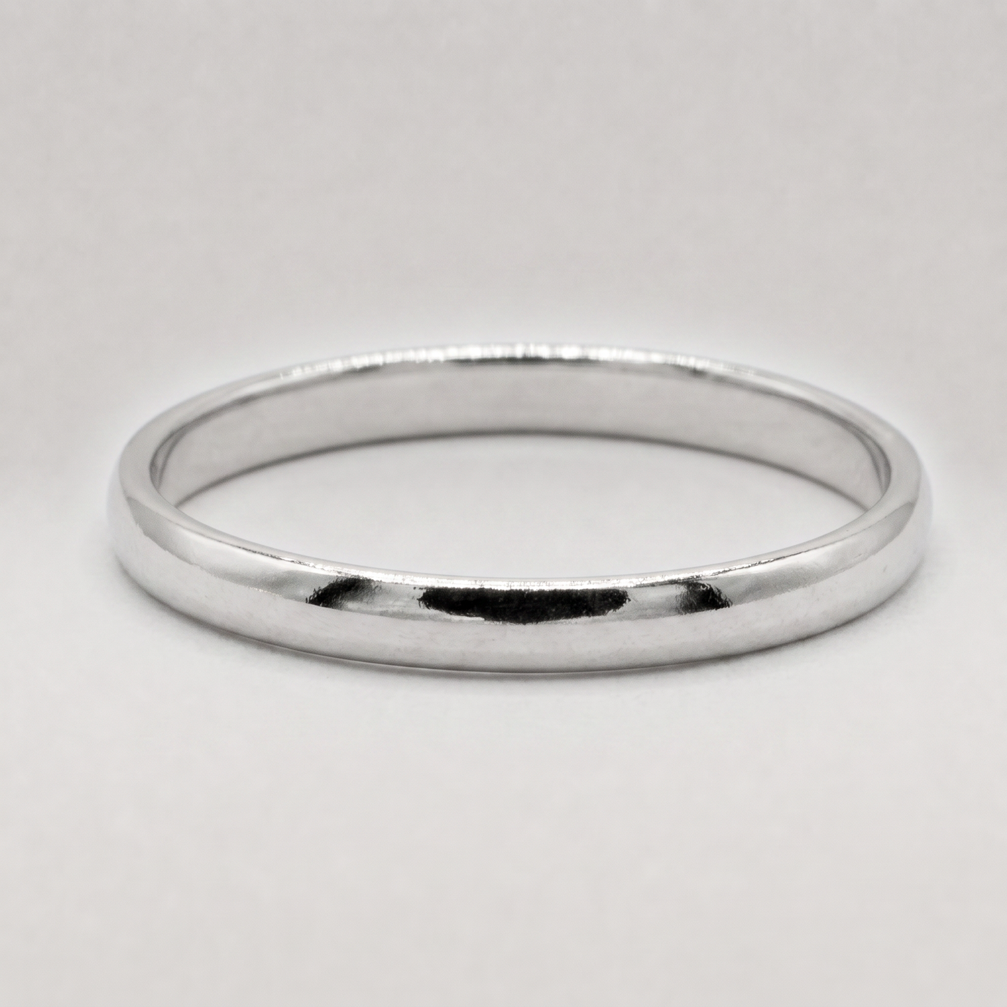 925 sterling silver band ring, 2mm width, on a plain background.